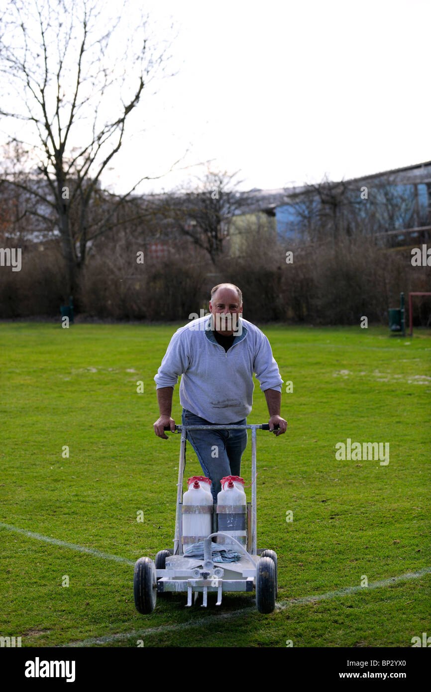 Green Keeper con gadget di marcatura Foto Stock