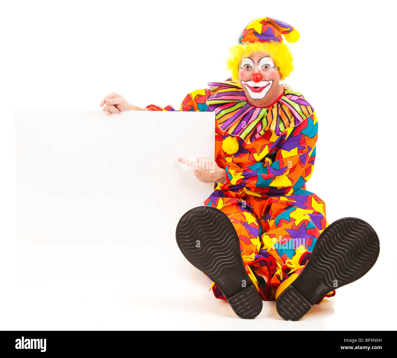 Allegro compleanno clown punti al nero spazio bianco pronto per il testo. Foto Stock