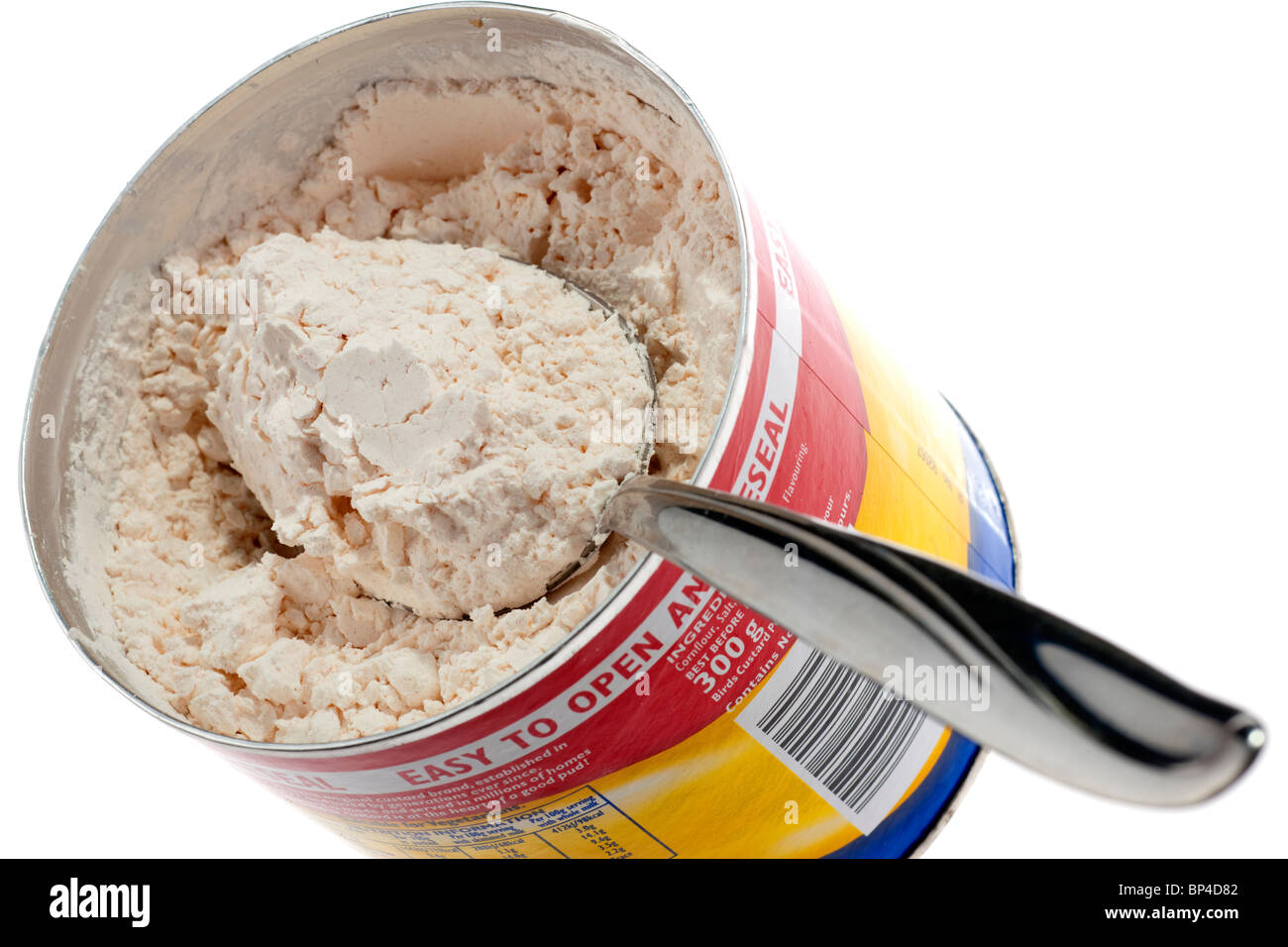 Cucchiaio da tavola di polvere di crema pasticcera in polvere in un contenitore di uccelli Foto Stock