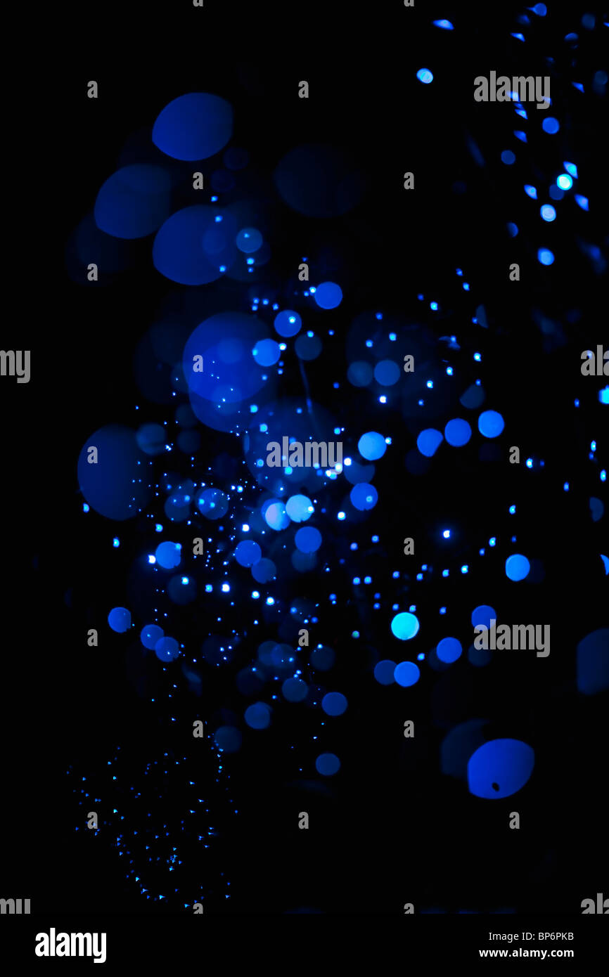 Punti blu, sfondo nero Foto Stock
