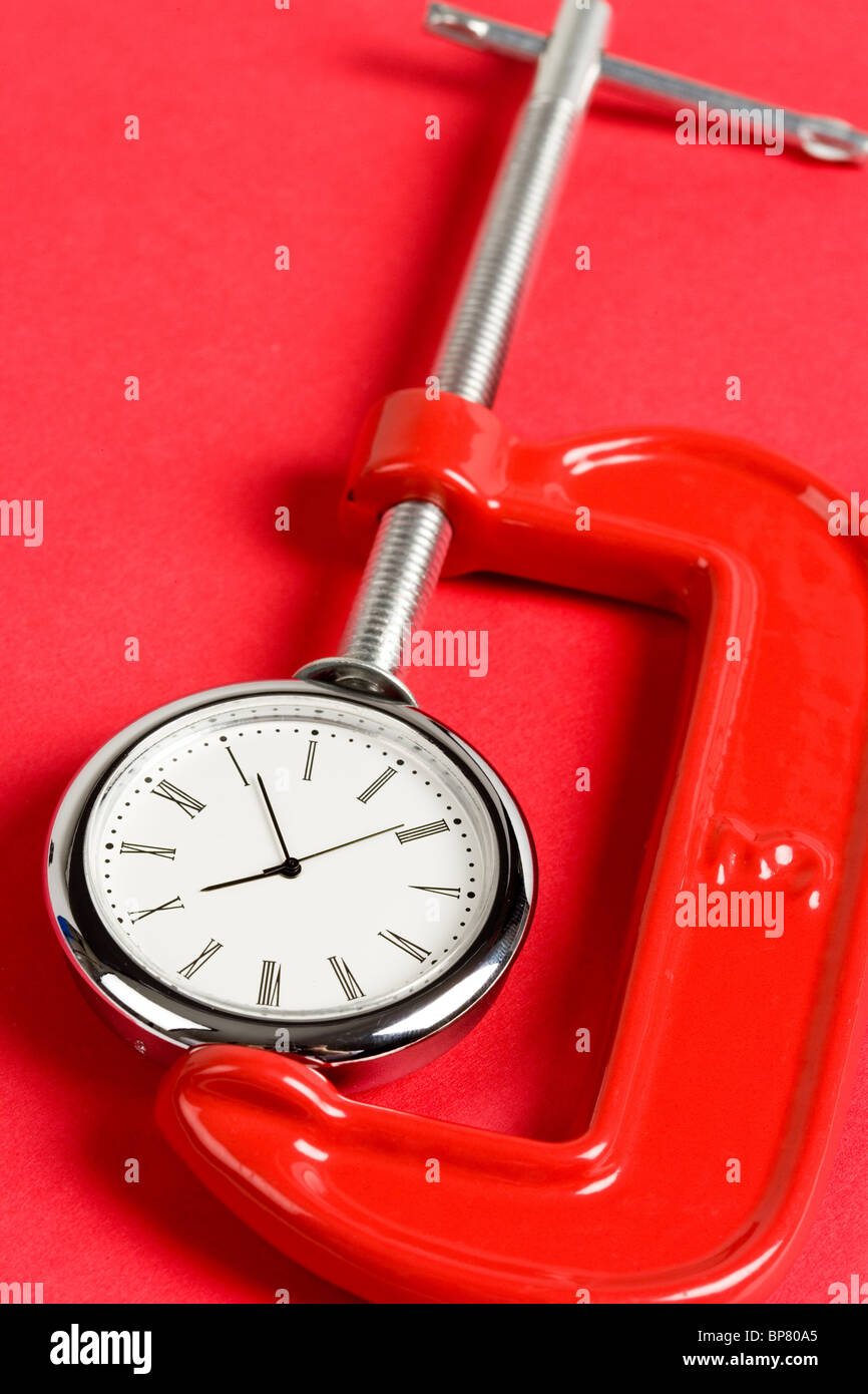 Vise Grip e orologio, concetto di occupato Foto Stock