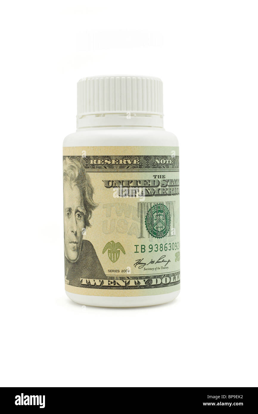 Venti dollari USA Bill sulla medicina bottiglia isolato su bianco Foto Stock
