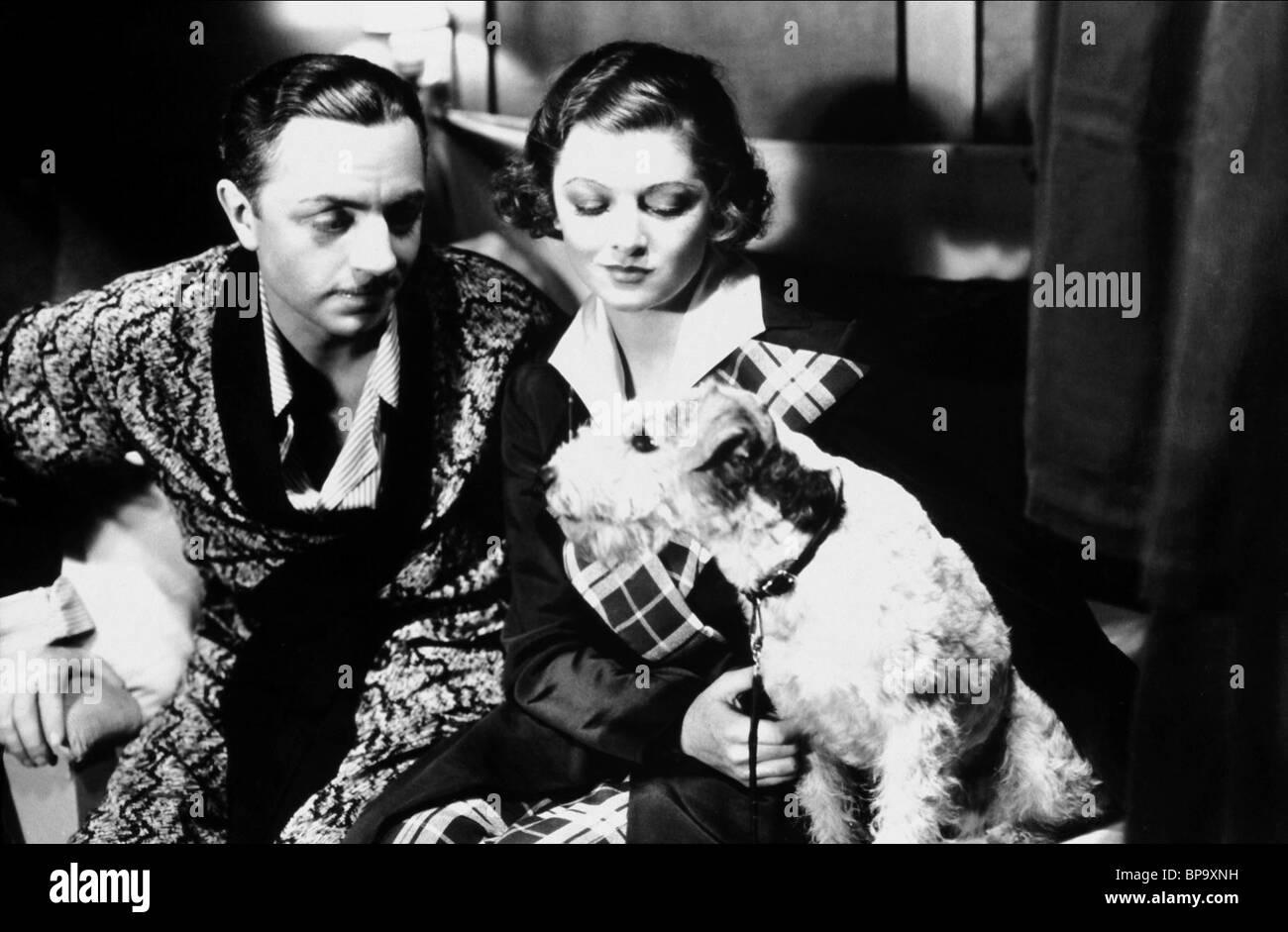 WILLIAM POWELL, Myrna Loy il sottile uomo, 1934 Foto Stock