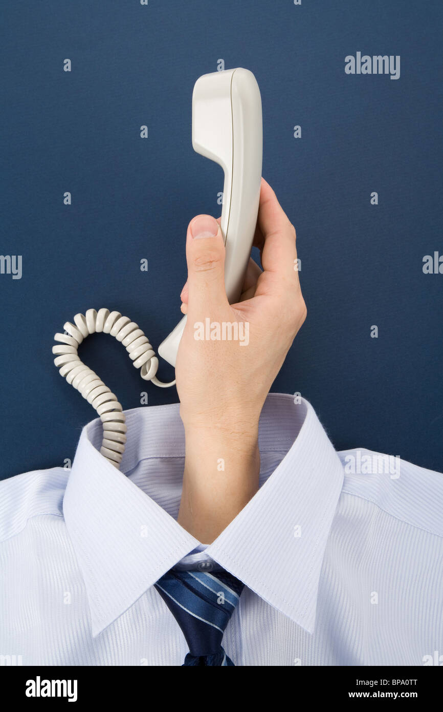 Camicia e la mano che tiene un telefono, la concezione di business Foto Stock