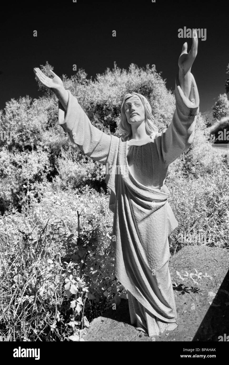 Statua di Gesù - la strada per Paleo Perithia Foto Stock