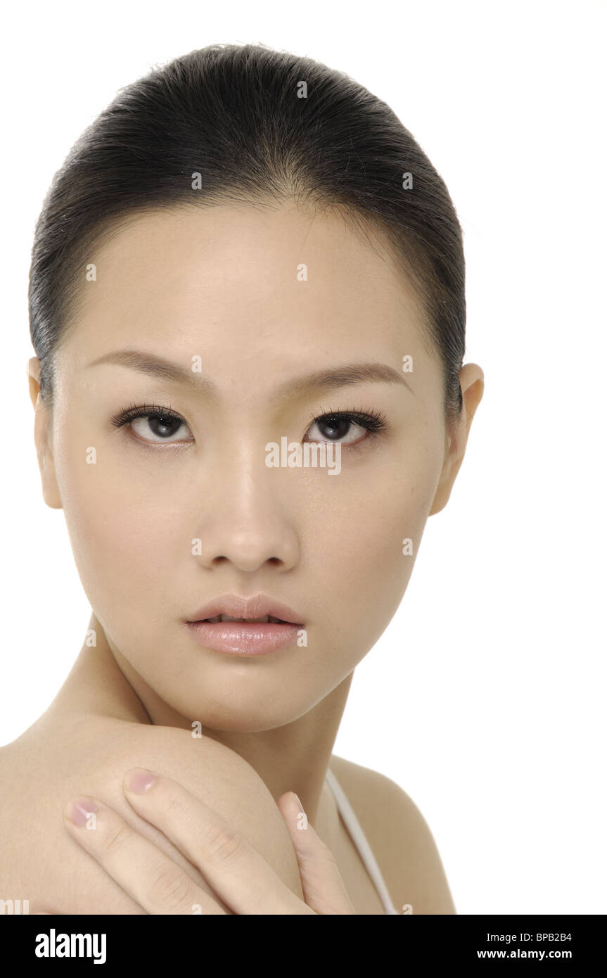 Ritratto di giovane donna adulta con la salute della pelle del viso Foto Stock