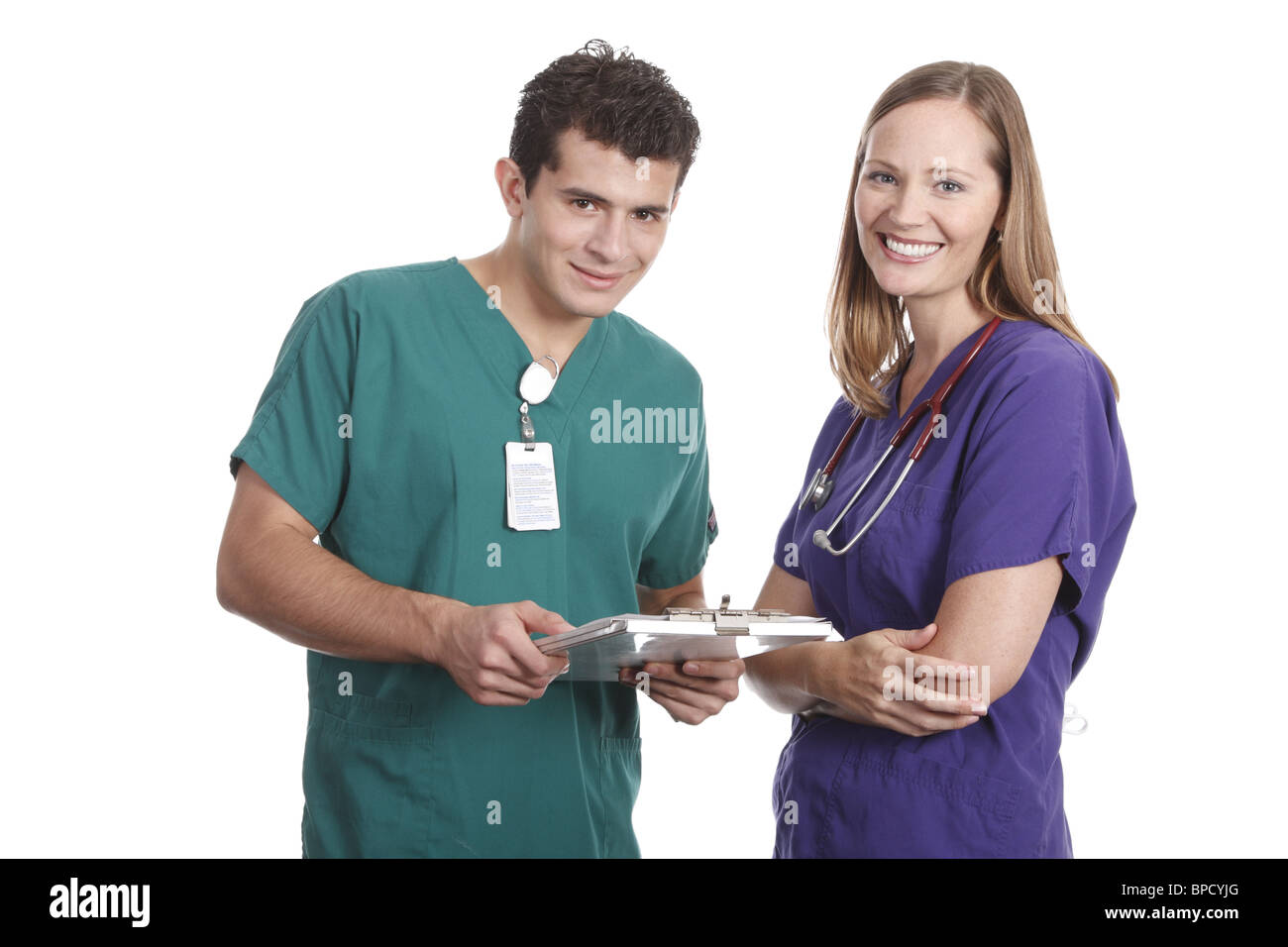 Il personale medico che va oltre il grafico del paziente Foto Stock