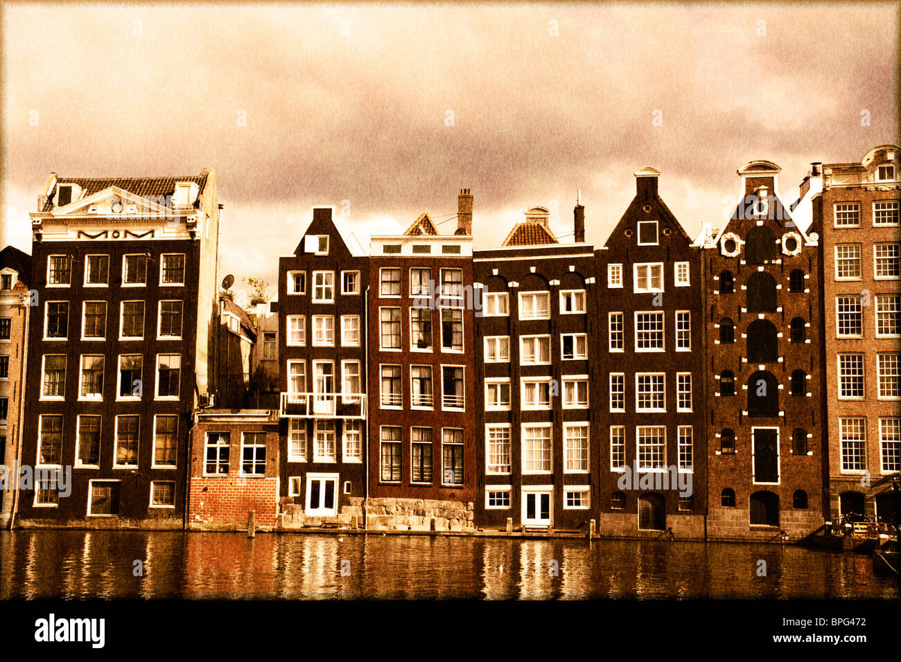 Amsterdam canal case con un vintage look seppia Foto Stock