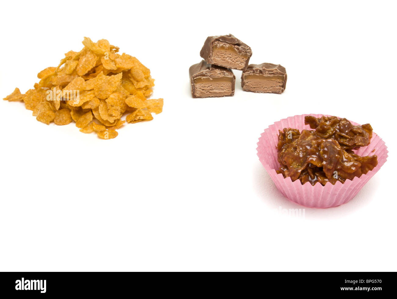 Tazza di cereali torte fatte da cornflakes e cioccolato fuso caramello bar. Foto Stock