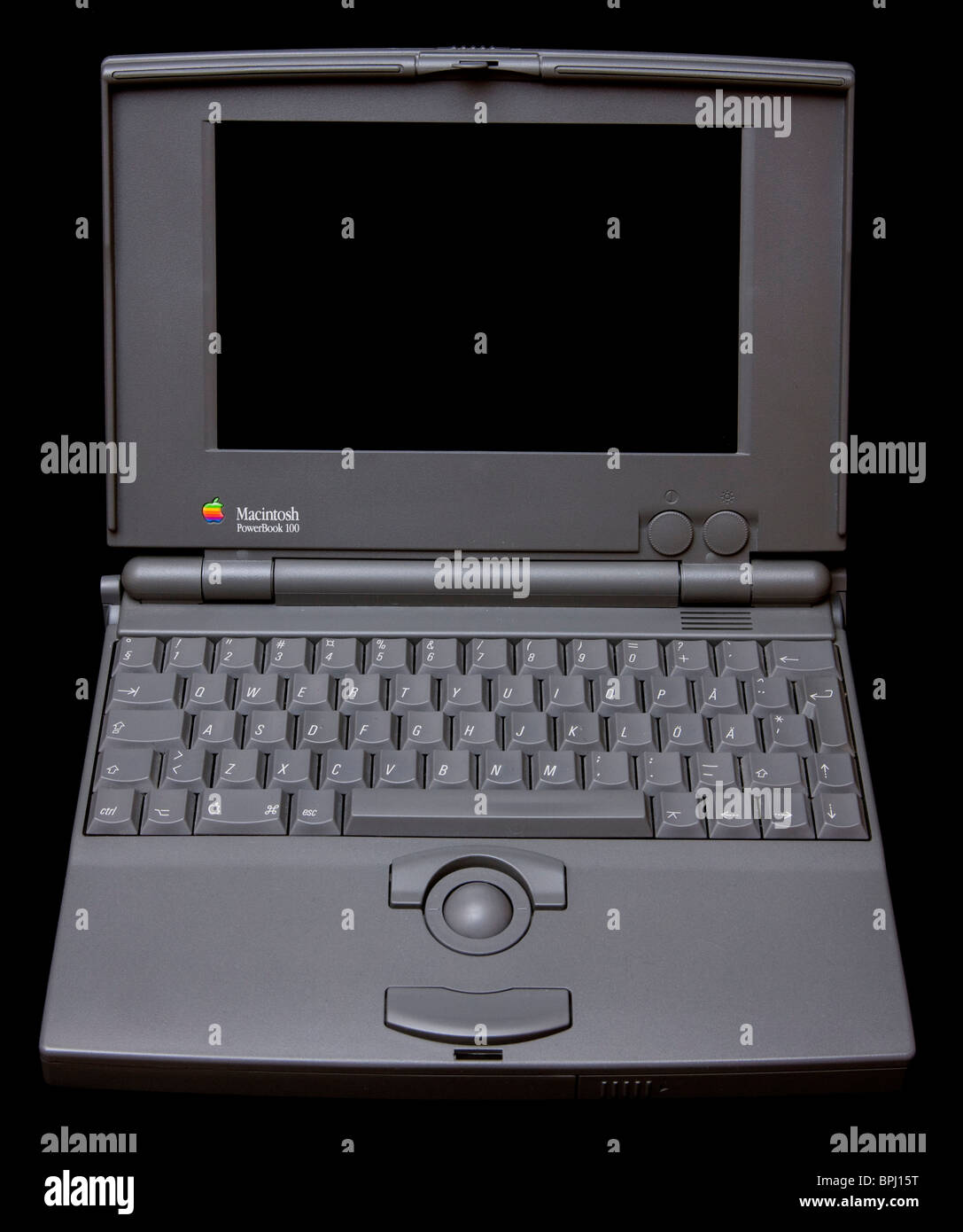 Macintosh Powerbook 100 su sfondo nero. Foto Stock