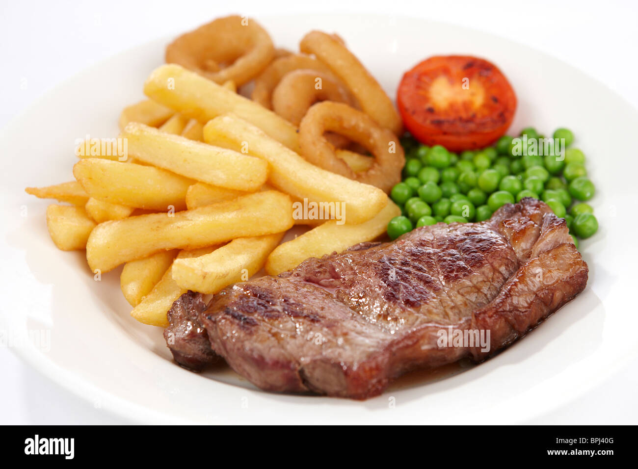 Chip di anelli di cipolla e la bistecca Foto Stock