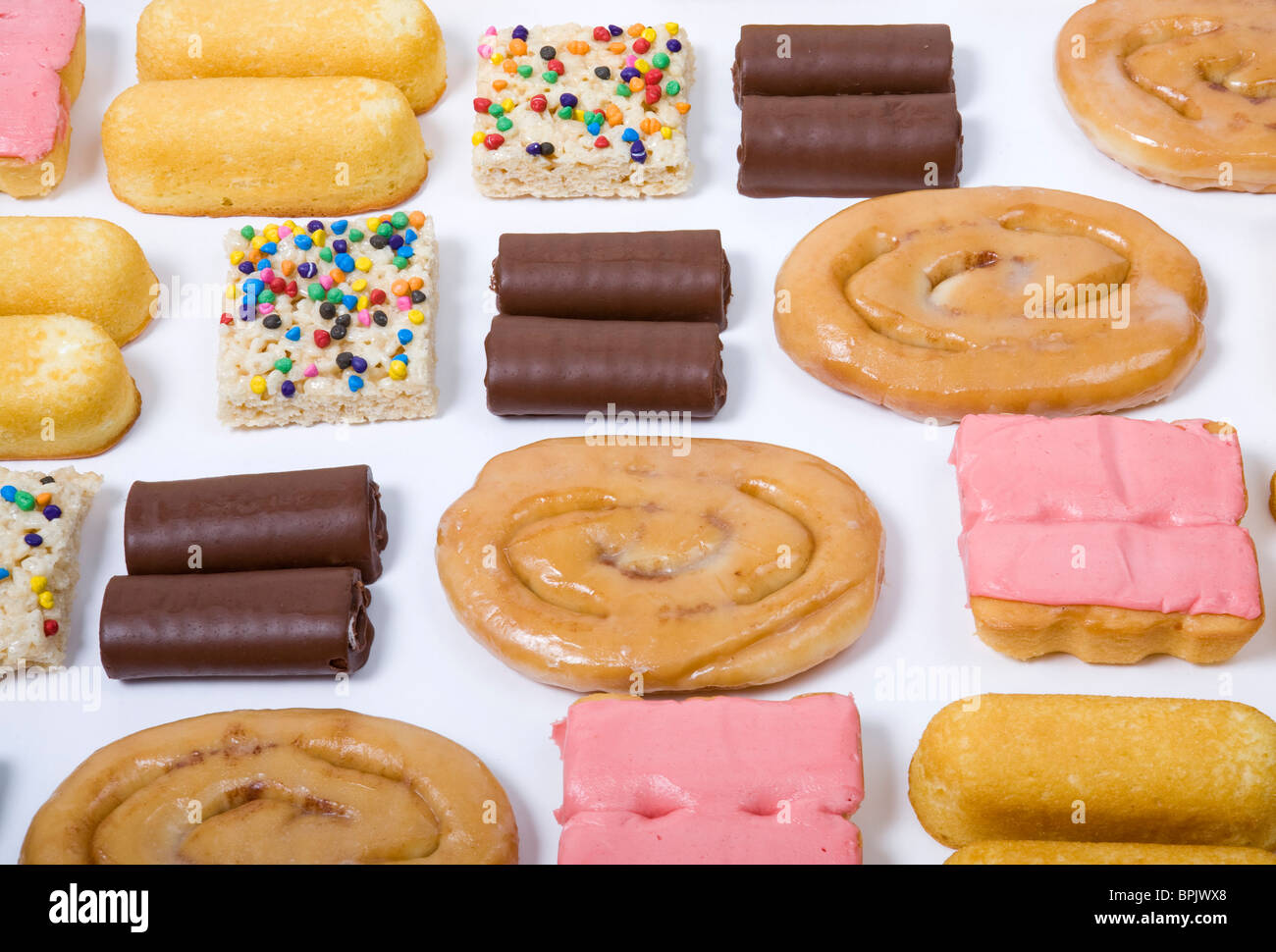 Un assortimento di junk food items. Foto Stock