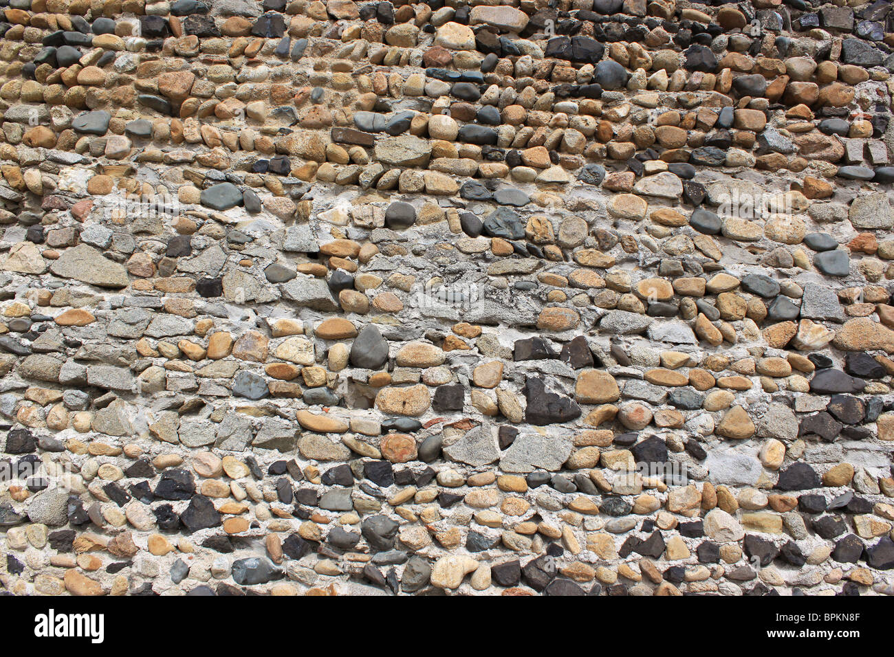 Muro di pietra per la costruzione e il restauro vero e proprio Foto Stock