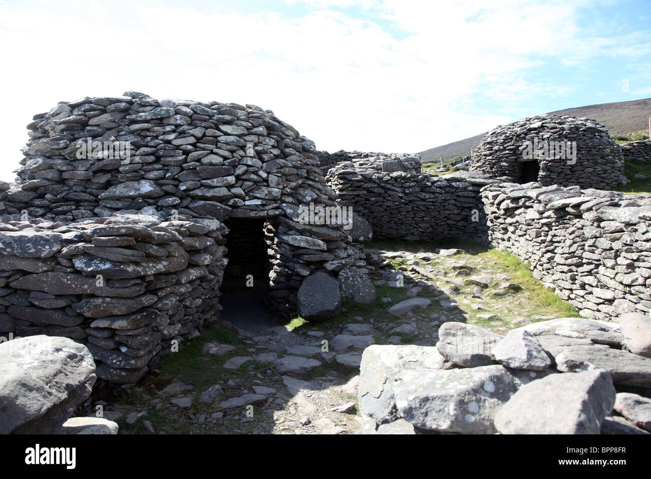 Dei primi Cristiani beehive capanne, penisola di Dingle, Co Kerry Irlanda Foto Stock