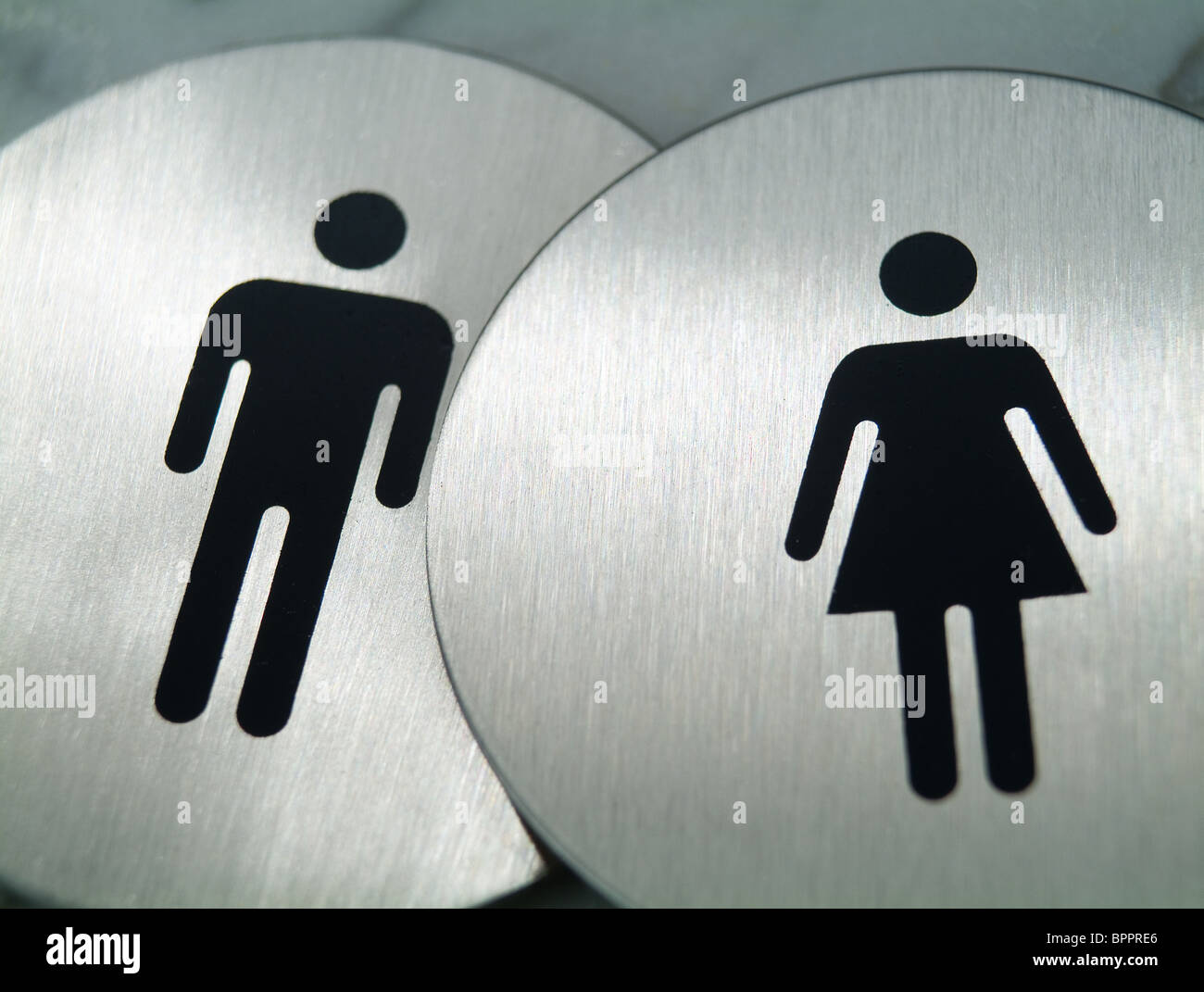 Indicazioni per uomini e donne wc Foto Stock