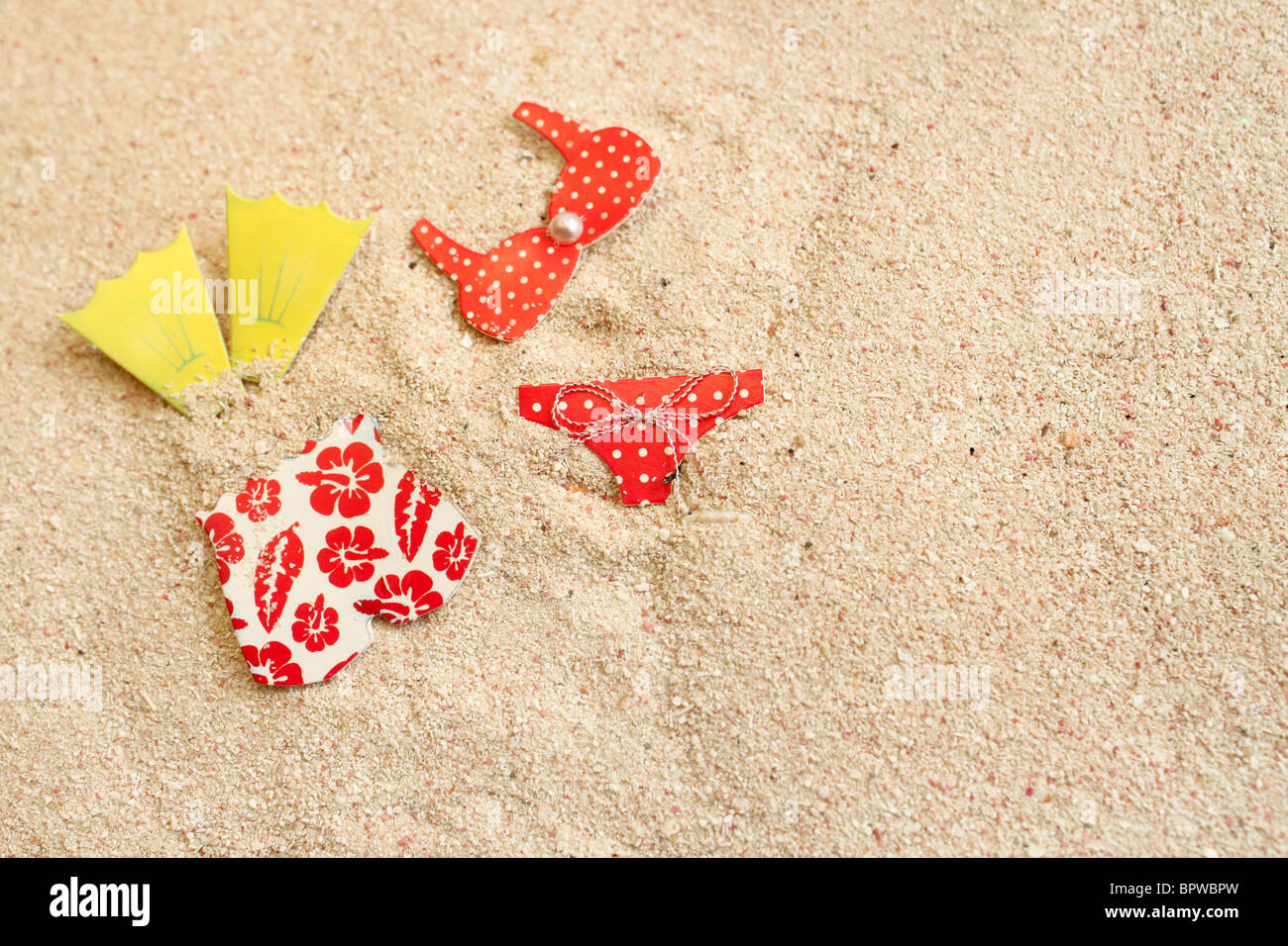 Uomo e donna costumi da bagno in spiaggia di sabbia, grande per un background di estate Foto Stock