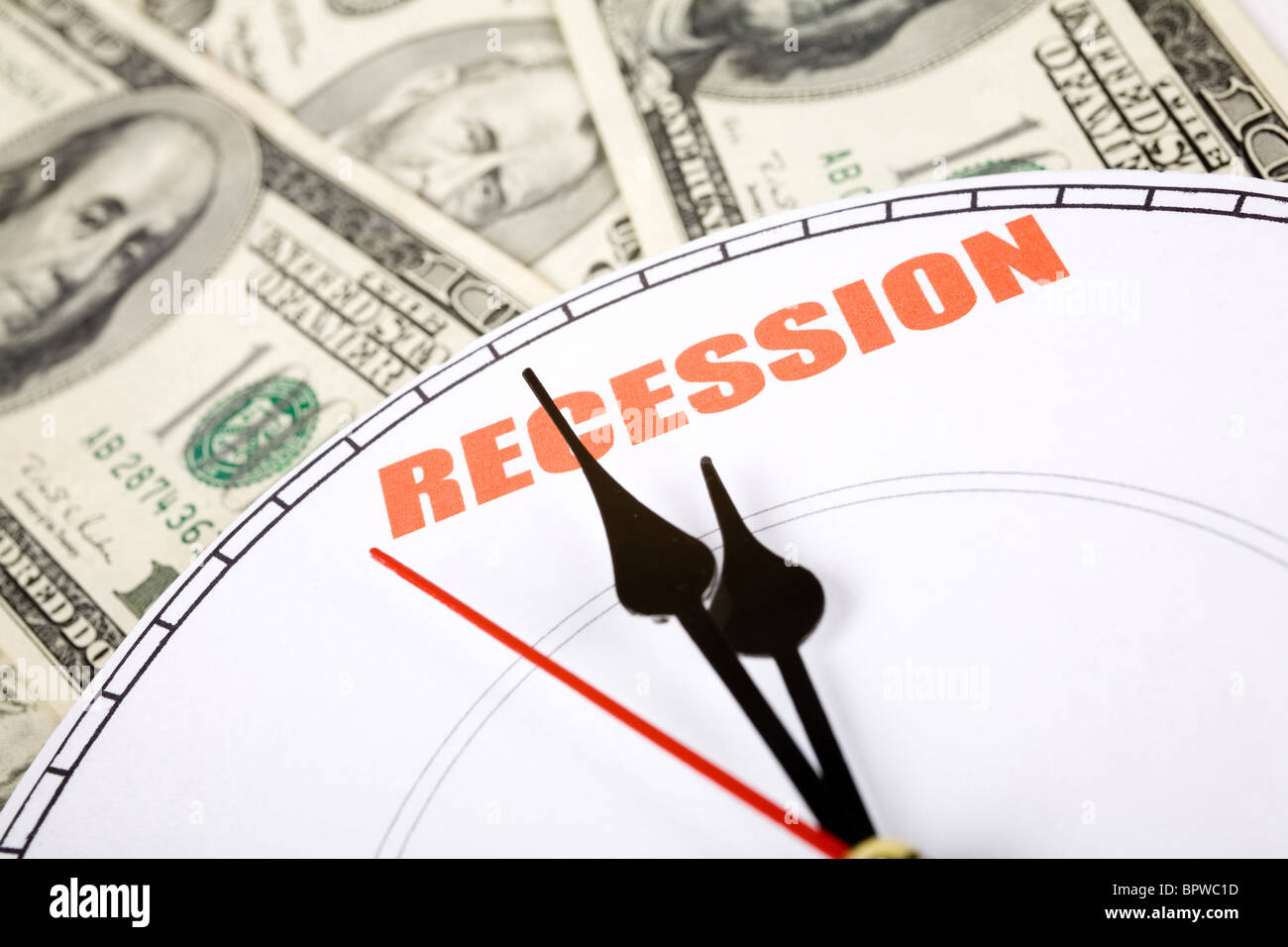 Dollaro e orologio, concetto di recessione economica Foto Stock