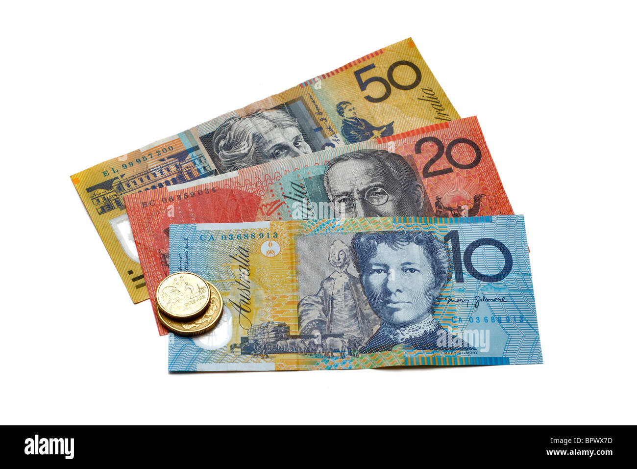 Una selezione di Australian le banconote e le monete in euro su sfondo bianco Foto Stock