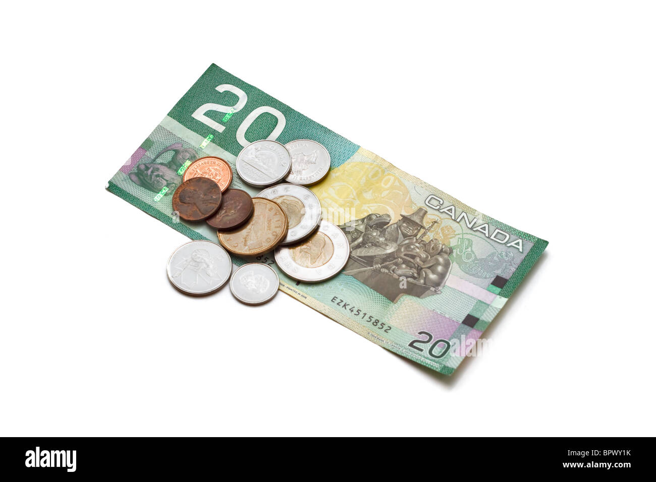 Canadian venti dollaro e monete su sfondo bianco Foto Stock