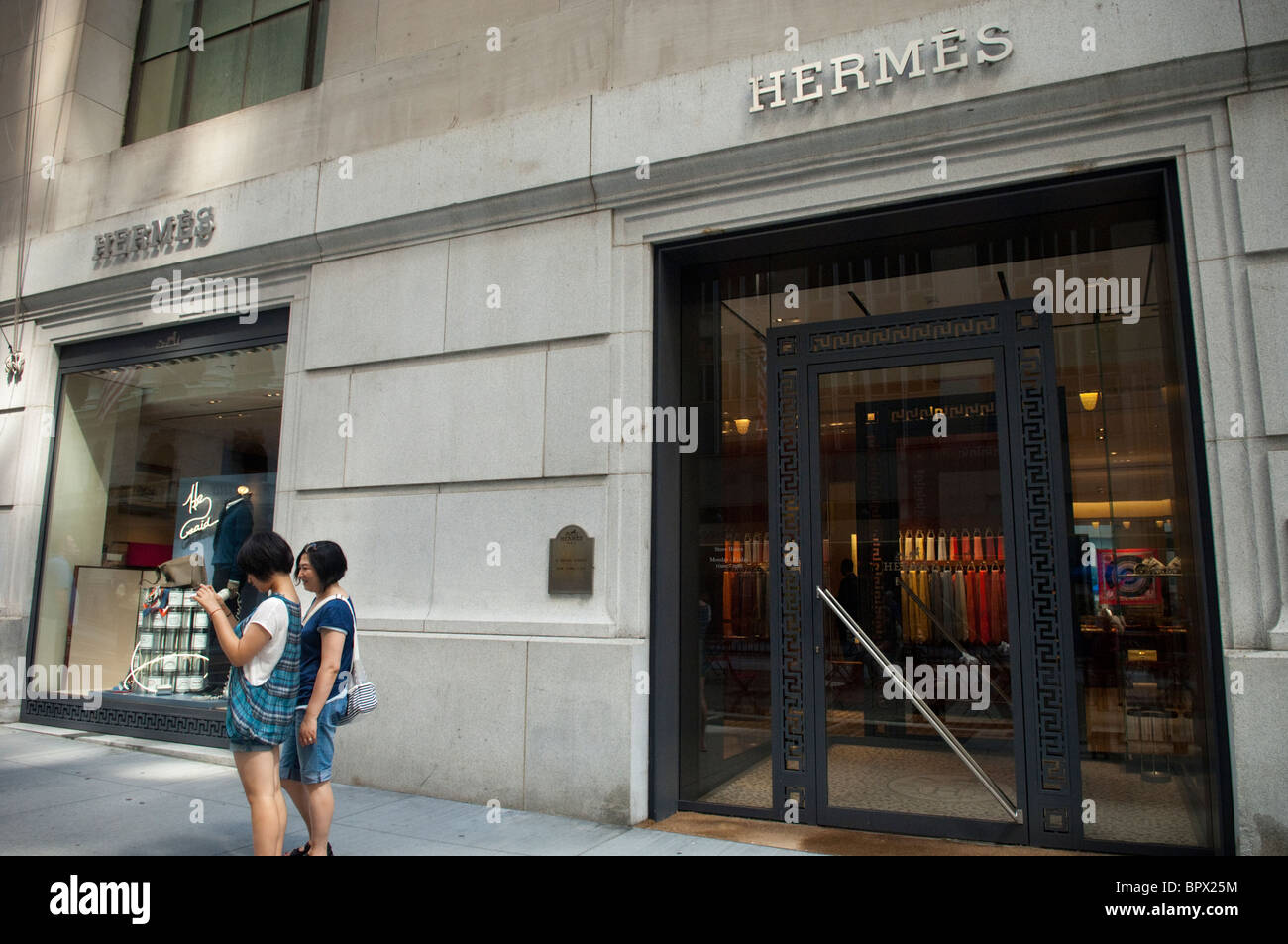 La Hermes store su Broad Street di fronte al New York Stock Exchange di New York Foto Stock