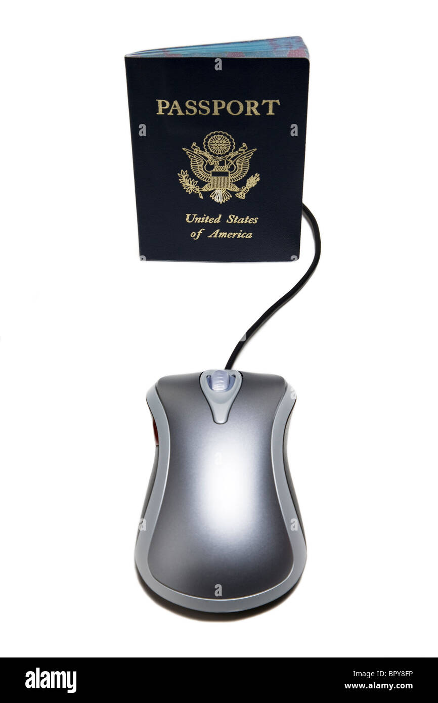 Il mouse del computer e del passaporto Foto Stock