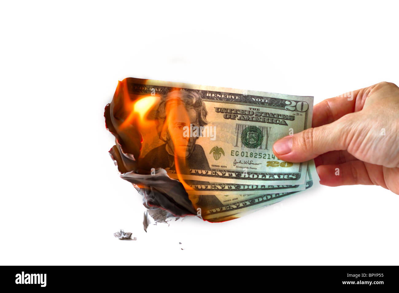 La masterizzazione di denaro. Una manciata di noi venti le fatture del dollaro sul fuoco. Foto Stock