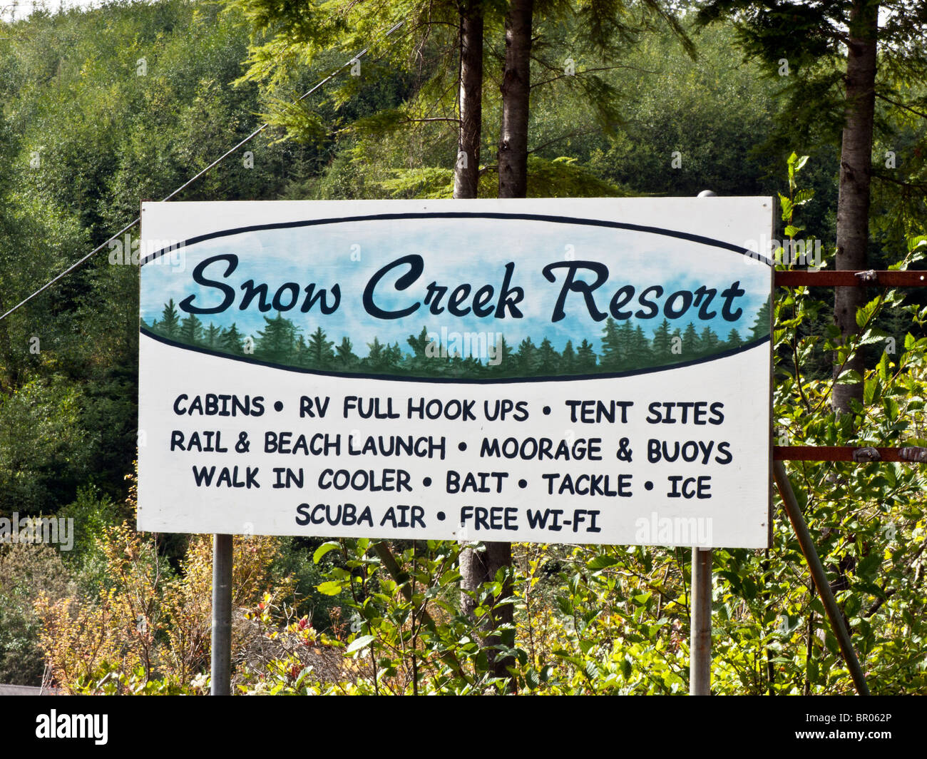 Affascinante Snow Creek Resort segno dipinto sulla costa nord della Penisola Olimpica elenco di accessori per la nautica pesca sportiva scuba Foto Stock