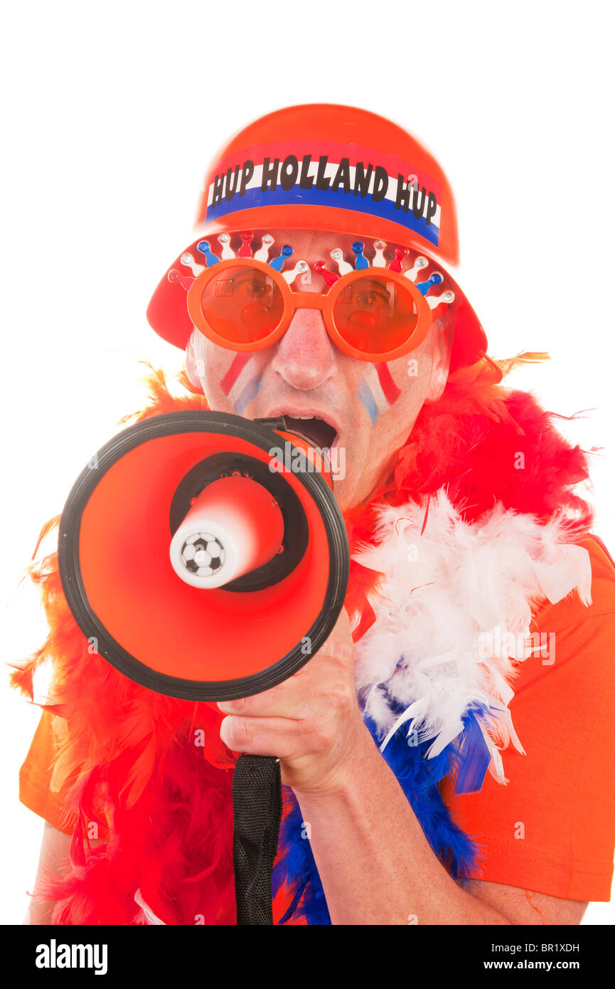Uomo olandese come sostenitore di calcio con megafono Foto Stock