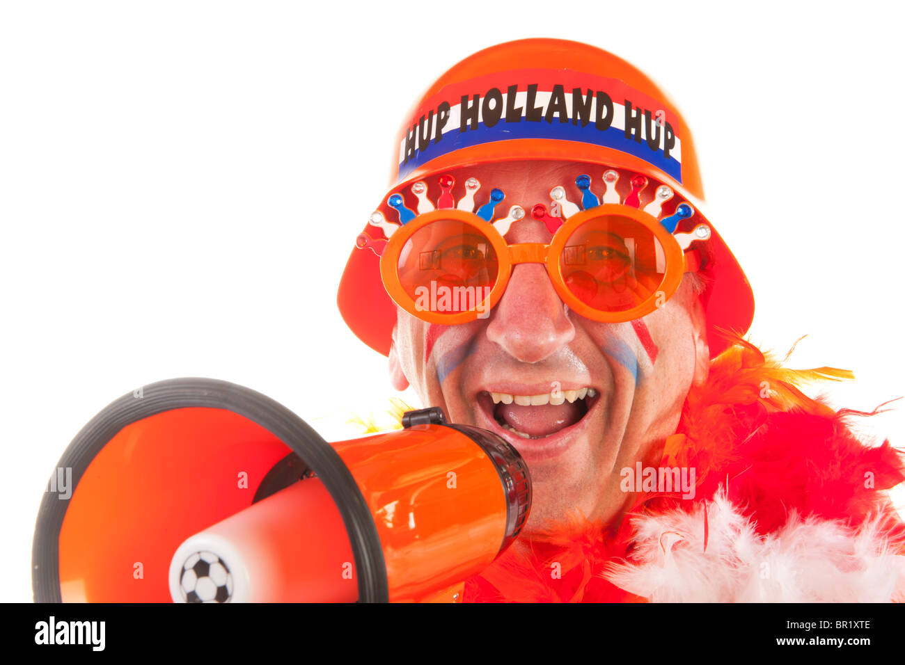 Uomo olandese come sostenitore di calcio con megafono Foto Stock