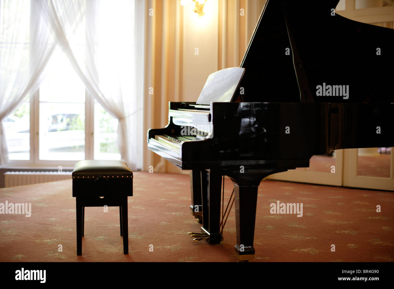 Musica per pianoforte pianoforte sedia Foto Stock