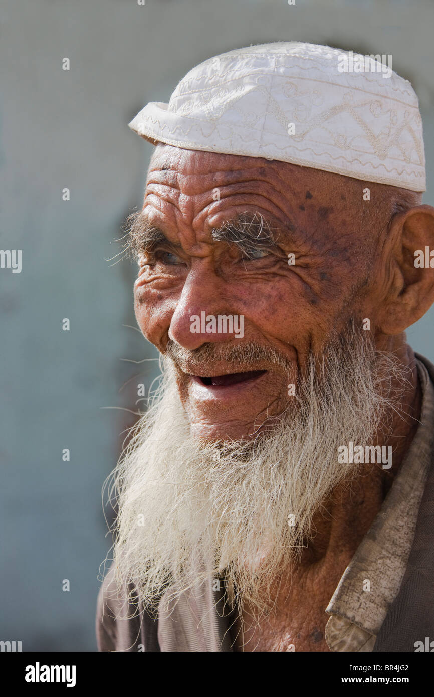 Uighur uomo, Hotan, Xinjiang, Cina Foto Stock