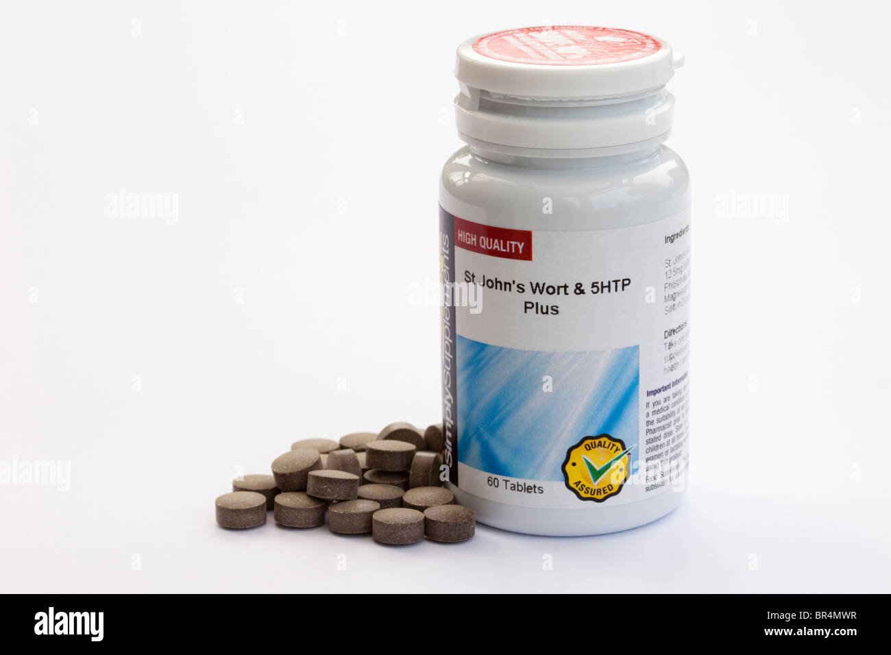 St Johns Wort e 5HTP complesso integratore alimentare vitamina pillole e contenitore. Per ridurre i sintomi della menopausa Foto Stock
