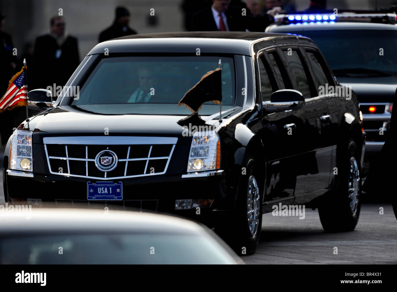 Corse di Obama nel suo limo durante la Parata inaugurale a Washington Foto Stock