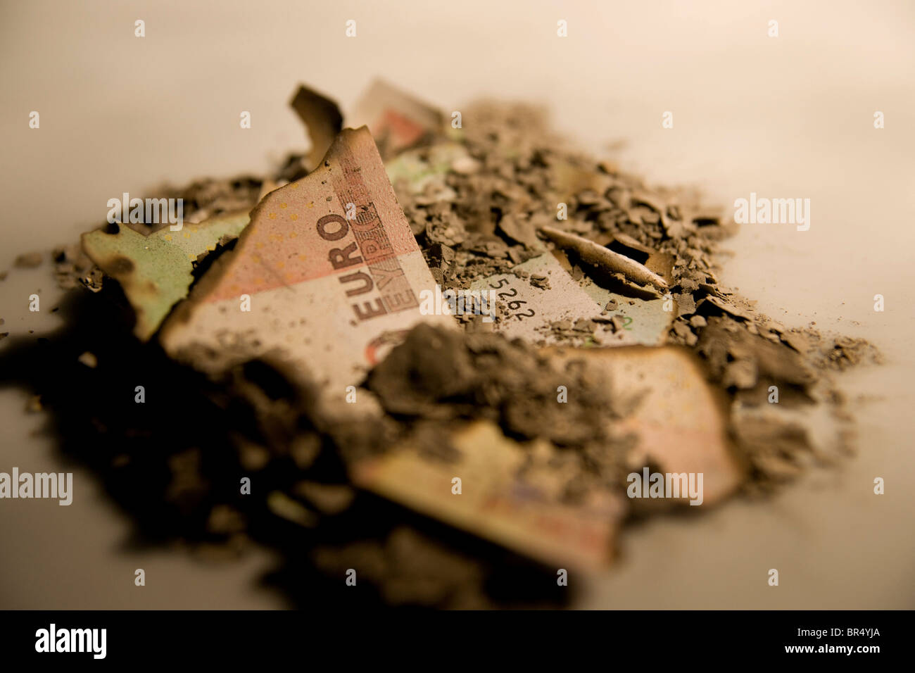 Soldi bruciati Foto Stock