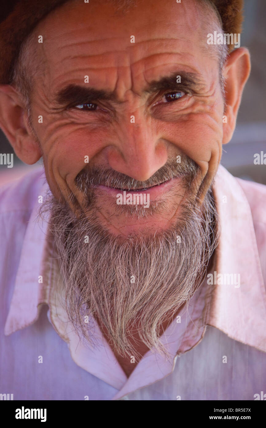 Ritratto di Uighur uomo, Hotan, Xinjiang, Cina Foto Stock