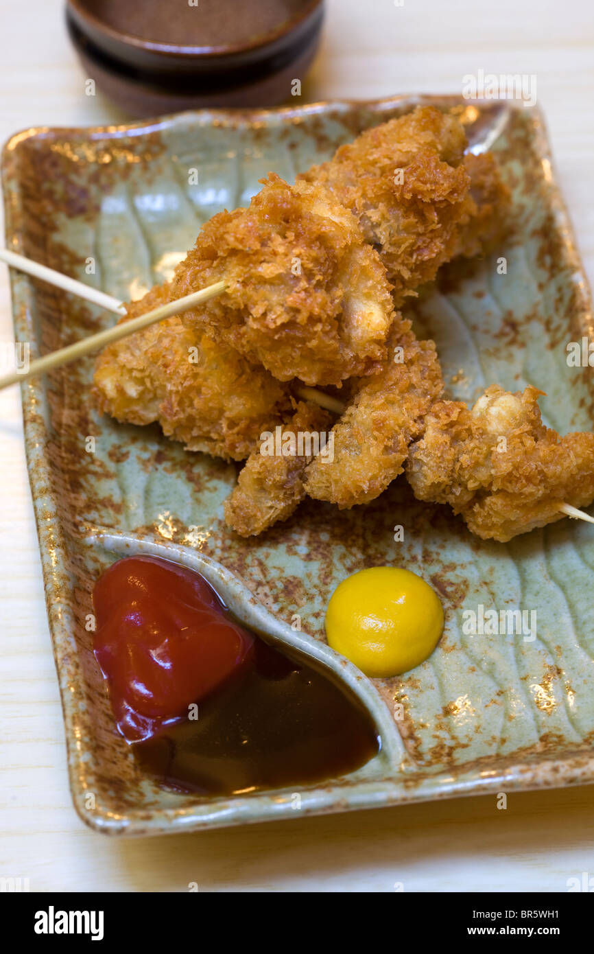 Chicken katsu (profondo fritto di pollo in briciole di pane) - il cibo giapponese Foto Stock