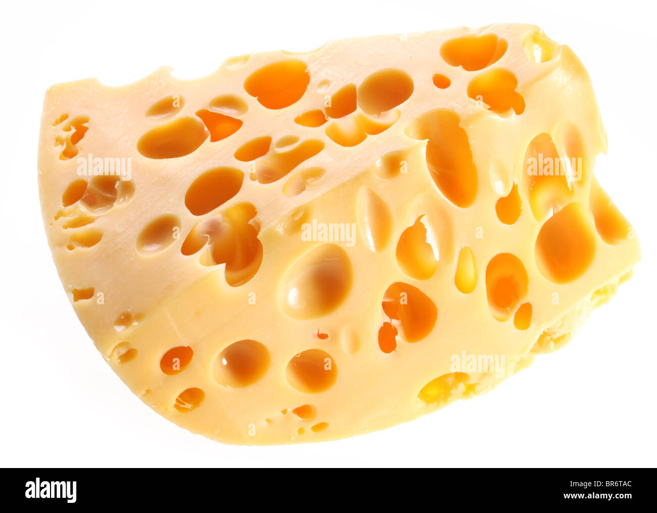 Pezzo di formaggio svizzero su uno sfondo bianco. Foto Stock