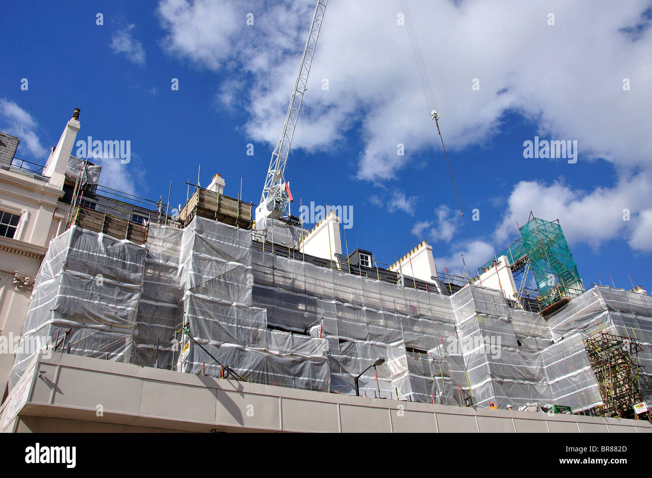 I lavori di ristrutturazione di case, Grosvenor Crescent, Belgravia, City of Westminster, Greater London, England, Regno Unito Foto Stock