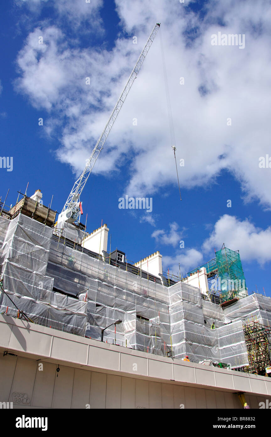 I lavori di ristrutturazione di case, Grosvenor Crescent, Belgravia, City of Westminster, Greater London, England, Regno Unito Foto Stock