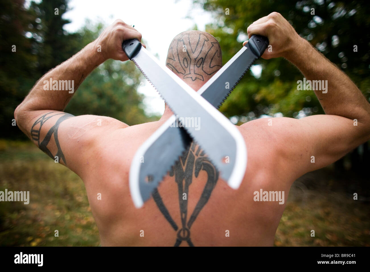L'uomo possiede con machete in Jeffersonville New York. Foto Stock