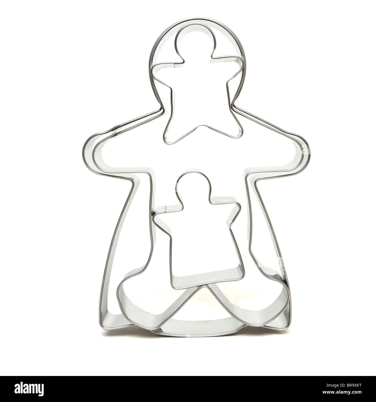 Unità familiare concetto astratto di set di cookie cutters isolato su bianco. Foto Stock