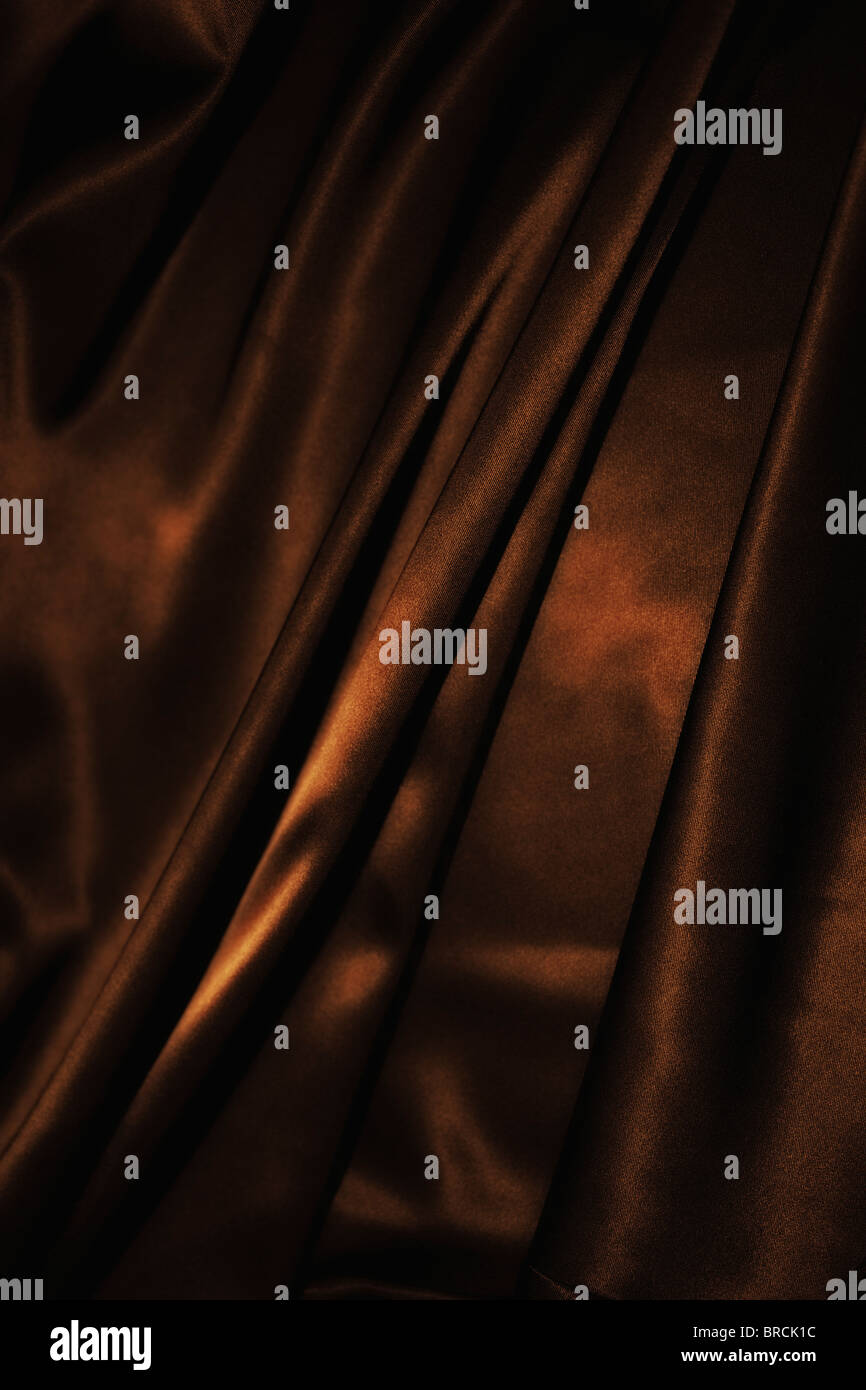 Texture di panno marrone cioccolato raso di seta close up Foto Stock