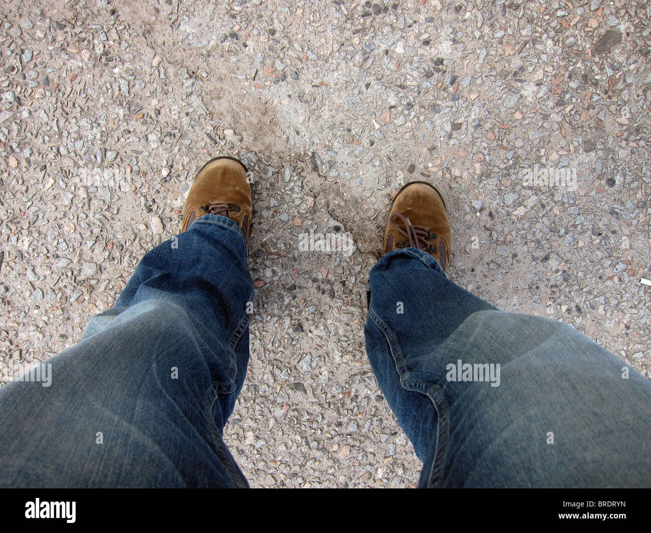 Piedi e terra con scarponi Foto Stock