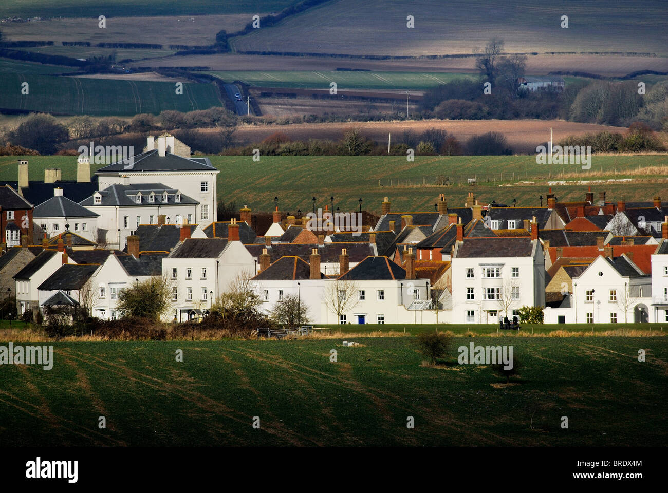 Una nuova costruzione ''villaggio' su un campo verde sito progettato dal principe di Galles, Poundbury, Dorchester Dorset, Regno Unito Febbraio 2010 Foto Stock