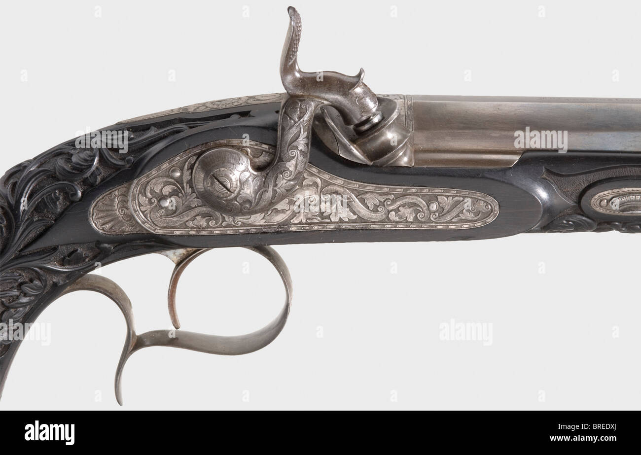 Un bel paio di pistole a percussione, Gastinne Renette, Parigi, circa 1850. Canne ottagonali, fori finemente rigati in calibro 10 mm con brache brevettuali e punti di vista in ferro. Sulle cime del barile la firma incisa 'par Gastinne Rennete arq del'Empereur a Paris'. Tanghi numerati rispettivamente '1' e '2'. Serrature a percussione cesellate con motivi floreali e mobili in ferro. Stock di ebano scolpiti con frondosa decorazione della vite in rilievo. Lunghezza di ogni 42 cm. In una cassa di legno rivestita di velluto con accessori completi. Dimensioni 46,5 x 25 x 7 cm. Gastinne Renette, Parigi, Menti, Foto Stock Un bel paio di pistole a percussione, Gastinne Renette, Parigi, circa 1850. Canne ottagonali, fori finemente rigati in calibro 10 mm con brache brevettuali e punti di vista in ferro. Sulle cime del barile la firma incisa 'par Gastinne Rennete arq del'Empereur a Paris'. Tanghi numerati rispettivamente '1' e '2'. Serrature a percussione cesellate con motivi floreali e mobili in ferro. Stock di ebano scolpiti con frondosa decorazione della vite in rilievo. Lunghezza di ogni 42 cm. In una cassa di legno rivestita di velluto con accessori completi. Dimensioni 46,5 x 25 x 7 cm. Gastinne Renette, Parigi, Menti, Foto Stock