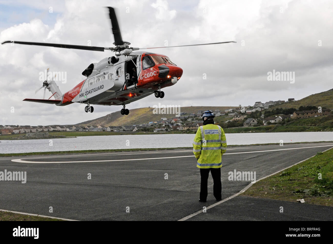 Oscar Charlie Coastguard Salvataggio in elicottero in atterraggio a Clickimin sito Foto Stock