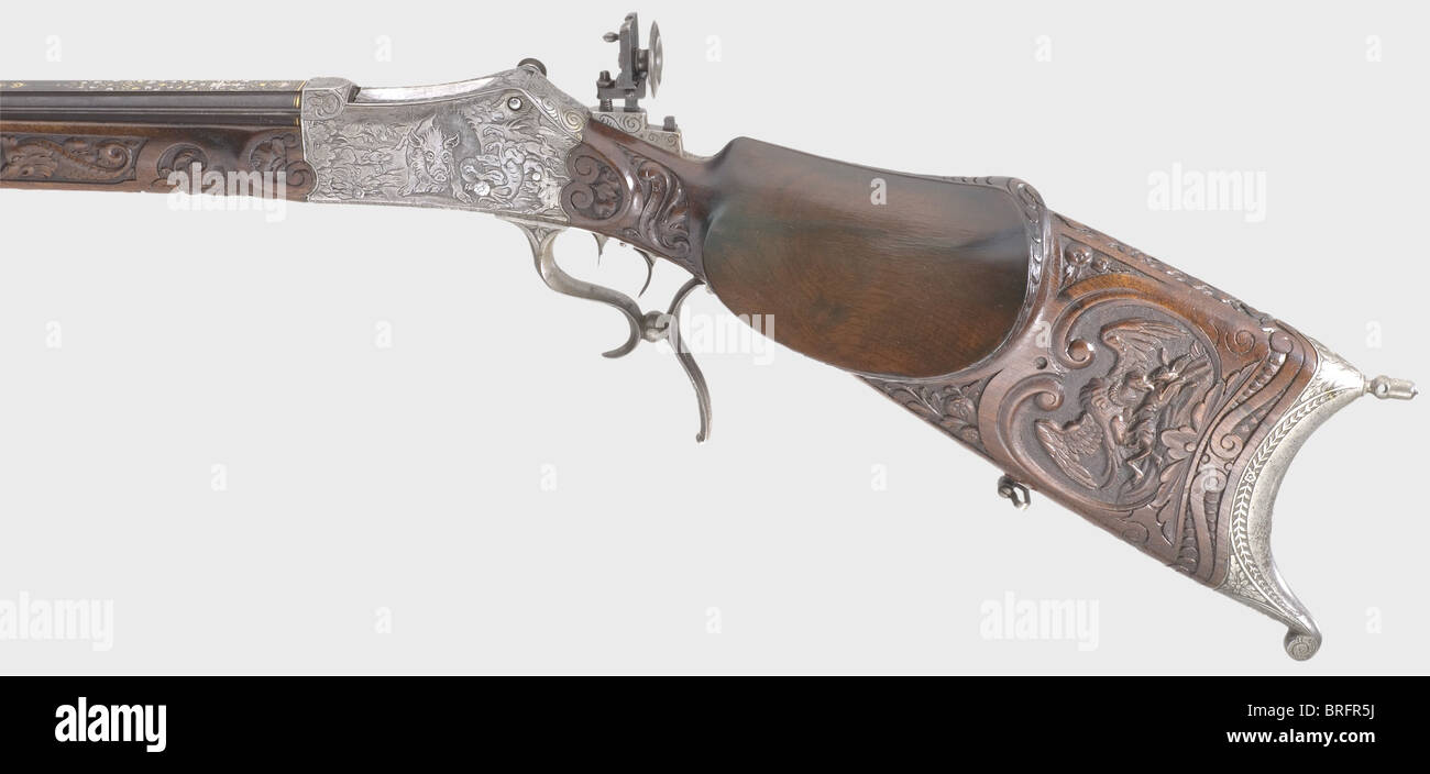 Un fucile di destinazione a caricamento di Breech splendido, Martini action.C.Stiegele,Munich,circa 1880.Caliber 8.15 x 46 R,number 33.Round con un avvistamento piatto e sei costole circostanti.Bore luminoso.la firma,'G.Stiegele jun.München' è intarsiata in oro sulla parte superiore del barile, e vi è sontuosa oro e argento intarabesco intarsiato sul ricettio Con scene di caccia nel tedesco rinascimentale legno stile.set trigger.apertura micrometrica regolabile Sight.Noce stock con ornamenti profondamente scolpiti.incisa furn di ferro, diritti aggiuntivi-clearences-non disponibile Foto Stock Un fucile di destinazione a caricamento di Breech splendido, Martini action.C.Stiegele,Munich,circa 1880.Caliber 8.15 x 46 R,number 33.Round con un avvistamento piatto e sei costole circostanti.Bore luminoso.la firma,'G.Stiegele jun.München' è intarsiata in oro sulla parte superiore del barile, e vi è sontuosa oro e argento intarabesco intarsiato sul ricettio Con scene di caccia nel tedesco rinascimentale legno stile.set trigger.apertura micrometrica regolabile Sight.Noce stock con ornamenti profondamente scolpiti.incisa furn di ferro, diritti aggiuntivi-clearences-non disponibile Foto Stock