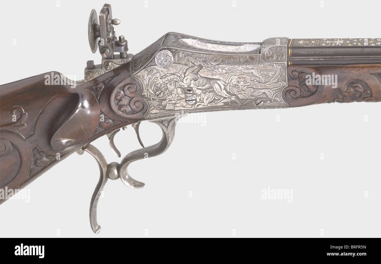 Un fucile di destinazione a caricamento di Breech splendido, Martini action.C.Stiegele,Munich,circa 1880.Caliber 8.15 x 46 R,number 33.Round con un avvistamento piatto e sei costole circostanti.Bore luminoso.la firma,'G.Stiegele jun.München' è intarsiata in oro sulla parte superiore del barile, e vi è sontuosa oro e argento intarabesco intarsiato sul ricettio Con scene di caccia nel tedesco rinascimentale legno stile.set trigger.apertura micrometrica regolabile Sight.Noce stock con ornamenti profondamente scolpiti.incisa furn di ferro, diritti aggiuntivi-clearences-non disponibile Foto Stock Un fucile di destinazione a caricamento di Breech splendido, Martini action.C.Stiegele,Munich,circa 1880.Caliber 8.15 x 46 R,number 33.Round con un avvistamento piatto e sei costole circostanti.Bore luminoso.la firma,'G.Stiegele jun.München' è intarsiata in oro sulla parte superiore del barile, e vi è sontuosa oro e argento intarabesco intarsiato sul ricettio Con scene di caccia nel tedesco rinascimentale legno stile.set trigger.apertura micrometrica regolabile Sight.Noce stock con ornamenti profondamente scolpiti.incisa furn di ferro, diritti aggiuntivi-clearences-non disponibile Foto Stock