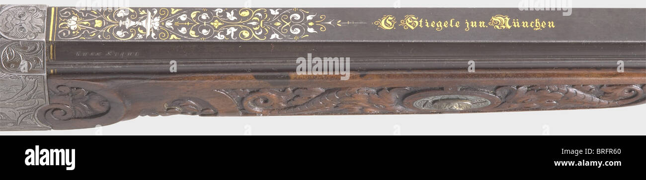 Un fucile di destinazione a caricamento di Breech splendido, Martini action.C.Stiegele,Munich,circa 1880.Caliber 8.15 x 46 R,number 33.Round con un avvistamento piatto e sei costole circostanti.Bore luminoso.la firma,'G.Stiegele jun.München' è intarsiata in oro sulla parte superiore del barile, e vi è sontuosa oro e argento intarabesco intarsiato sul ricettio Con scene di caccia nel tedesco rinascimentale legno stile.set trigger.apertura micrometrica regolabile Sight.Noce stock con ornamenti profondamente scolpiti.incisa furn di ferro, diritti aggiuntivi-clearences-non disponibile Foto Stock Un fucile di destinazione a caricamento di Breech splendido, Martini action.C.Stiegele,Munich,circa 1880.Caliber 8.15 x 46 R,number 33.Round con un avvistamento piatto e sei costole circostanti.Bore luminoso.la firma,'G.Stiegele jun.München' è intarsiata in oro sulla parte superiore del barile, e vi è sontuosa oro e argento intarabesco intarsiato sul ricettio Con scene di caccia nel tedesco rinascimentale legno stile.set trigger.apertura micrometrica regolabile Sight.Noce stock con ornamenti profondamente scolpiti.incisa furn di ferro, diritti aggiuntivi-clearences-non disponibile Foto Stock