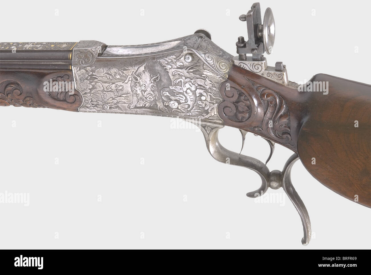 Un fucile di destinazione a caricamento di Breech splendido, Martini action.C.Stiegele,Munich,circa 1880.Caliber 8.15 x 46 R,number 33.Round con un avvistamento piatto e sei costole circostanti.Bore luminoso.la firma,'G.Stiegele jun.München' è intarsiata in oro sulla parte superiore del barile, e vi è sontuosa oro e argento intarabesco intarsiato sul ricettio Con scene di caccia nel tedesco rinascimentale legno stile.set trigger.apertura micrometrica regolabile Sight.Noce stock con ornamenti profondamente scolpiti.incisa furn di ferro, diritti aggiuntivi-clearences-non disponibile Foto Stock Un fucile di destinazione a caricamento di Breech splendido, Martini action.C.Stiegele,Munich,circa 1880.Caliber 8.15 x 46 R,number 33.Round con un avvistamento piatto e sei costole circostanti.Bore luminoso.la firma,'G.Stiegele jun.München' è intarsiata in oro sulla parte superiore del barile, e vi è sontuosa oro e argento intarabesco intarsiato sul ricettio Con scene di caccia nel tedesco rinascimentale legno stile.set trigger.apertura micrometrica regolabile Sight.Noce stock con ornamenti profondamente scolpiti.incisa furn di ferro, diritti aggiuntivi-clearences-non disponibile Foto Stock